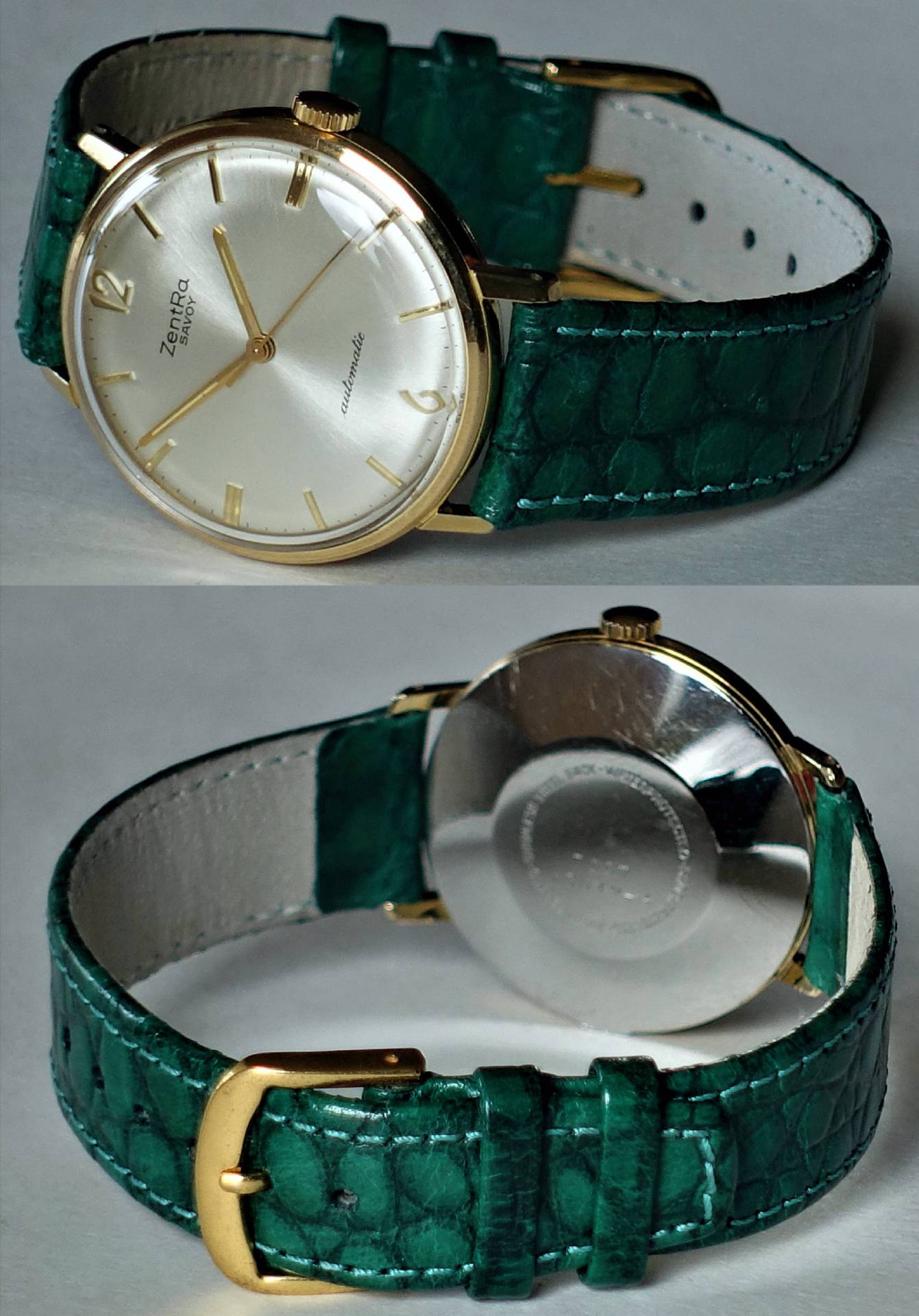 Analoge Armbanduhr mit grünem Armband und goldfarbenem Gehäuse.