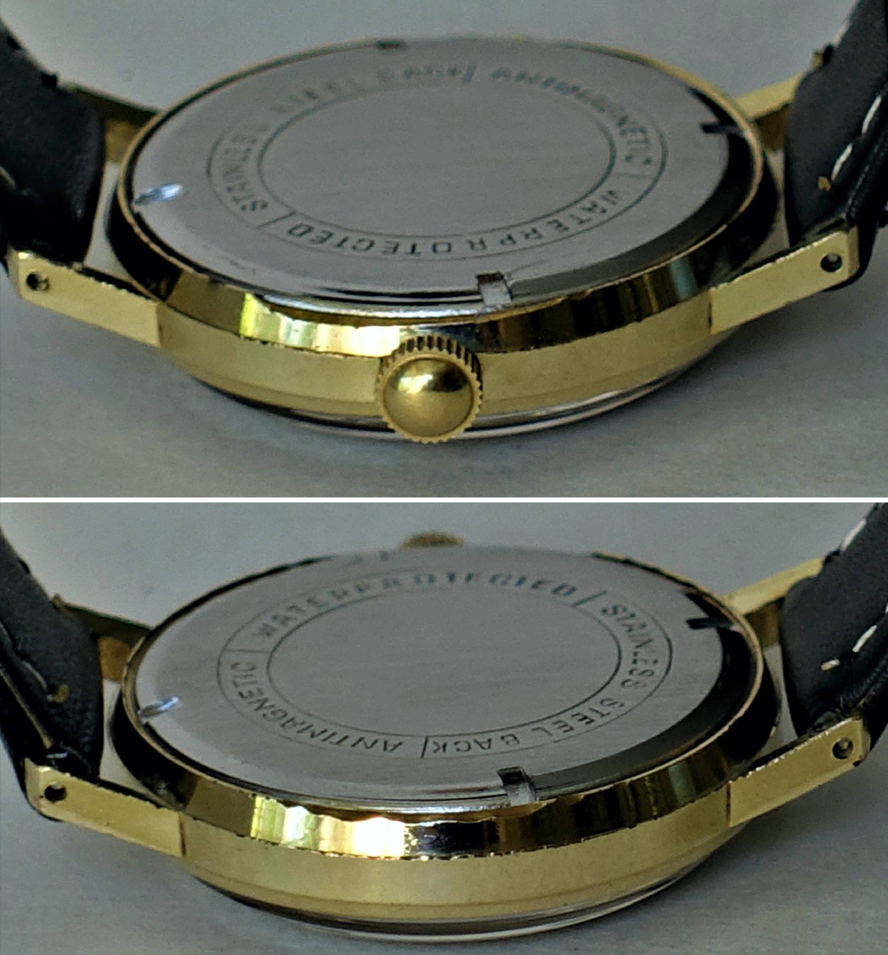 Rundes goldfarbenes Uhrgehäuse mit silberfarbener Rückseite und schwarzem Armband.