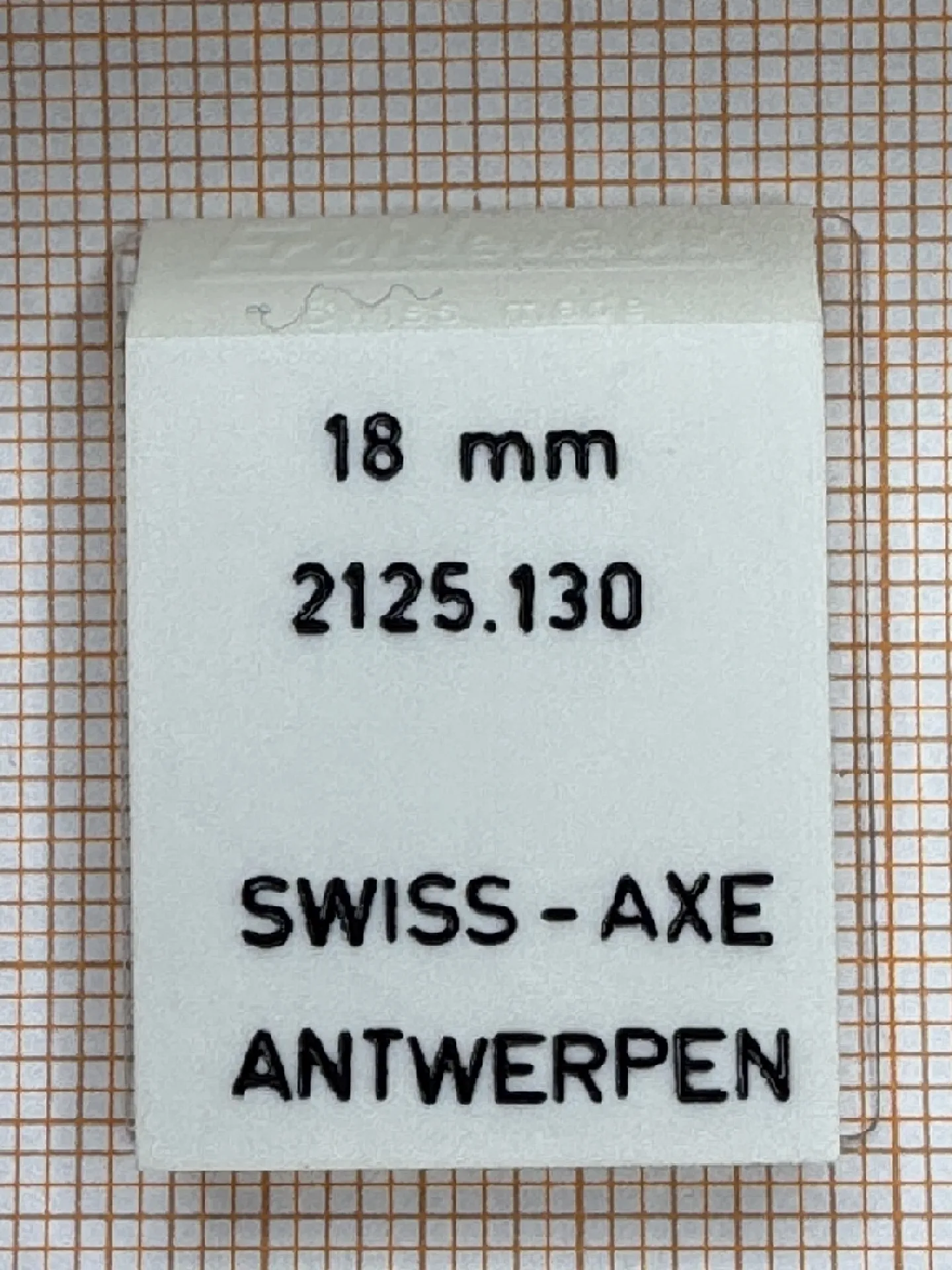 Weißer Federsteg für Uhren mit 18 Millimeter Breite.