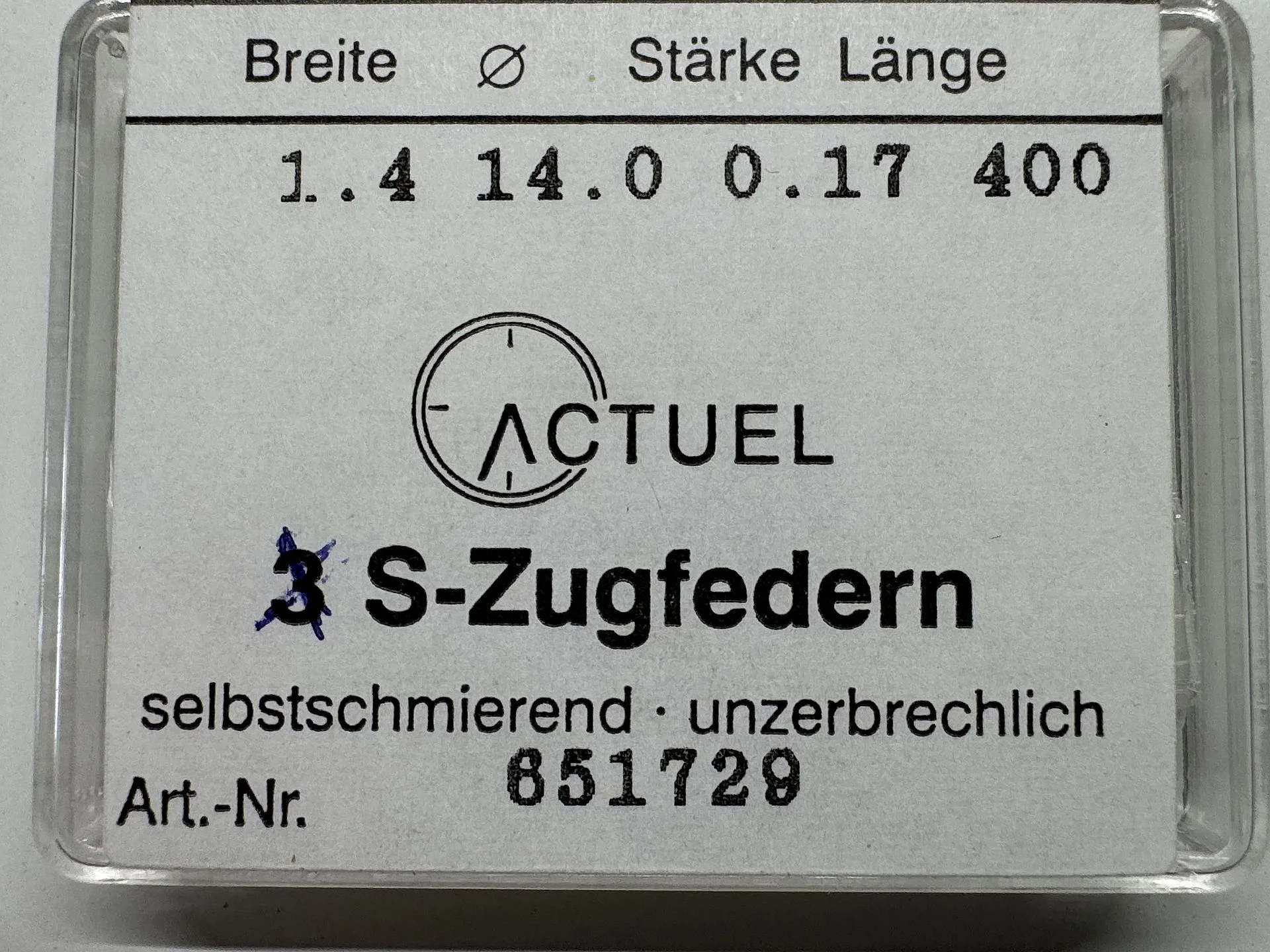 Verpackung mit drei selbstschmierenden S-Zugfedern für Uhrwerke.