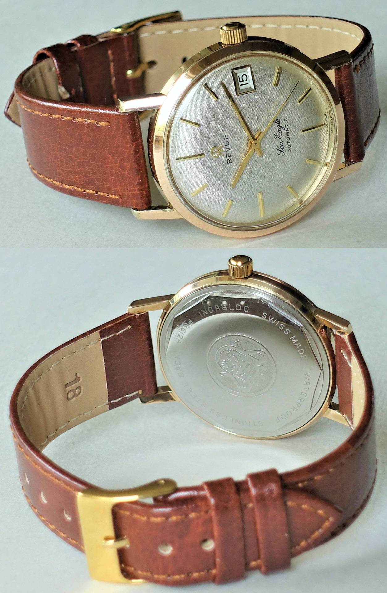 Goldfarbene Armbanduhr mit braunem Lederarmband und silberfarbenem Zifferblatt.