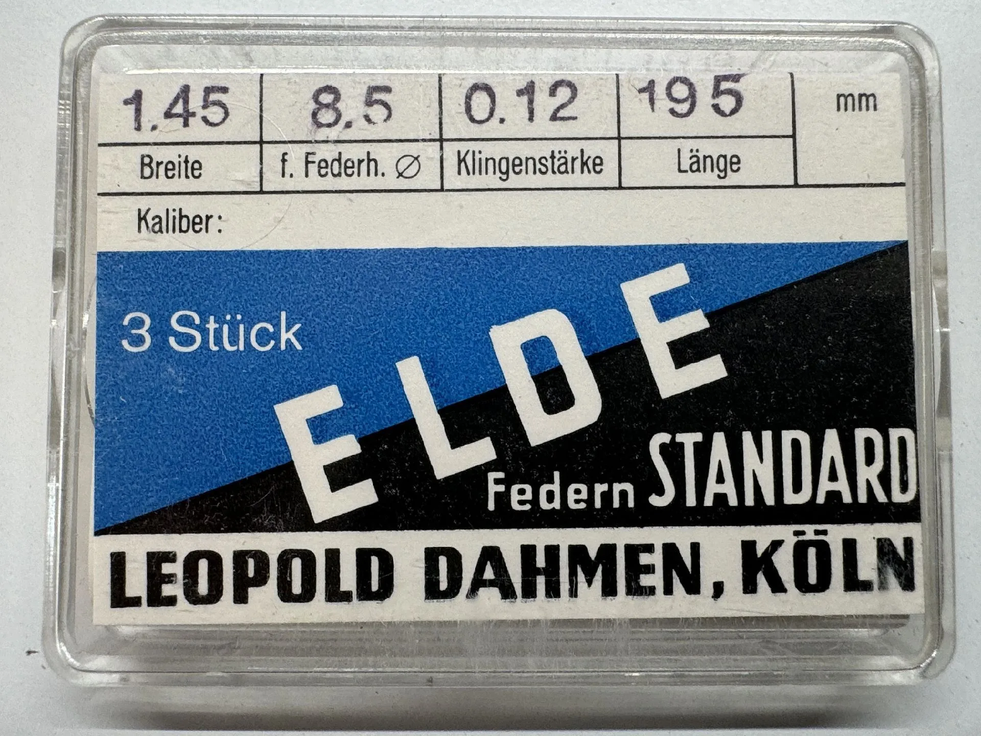 ELDE Federn Standard Verpackung mit drei Uhrfedern der Marke ELDE für Uhrenreparatur.