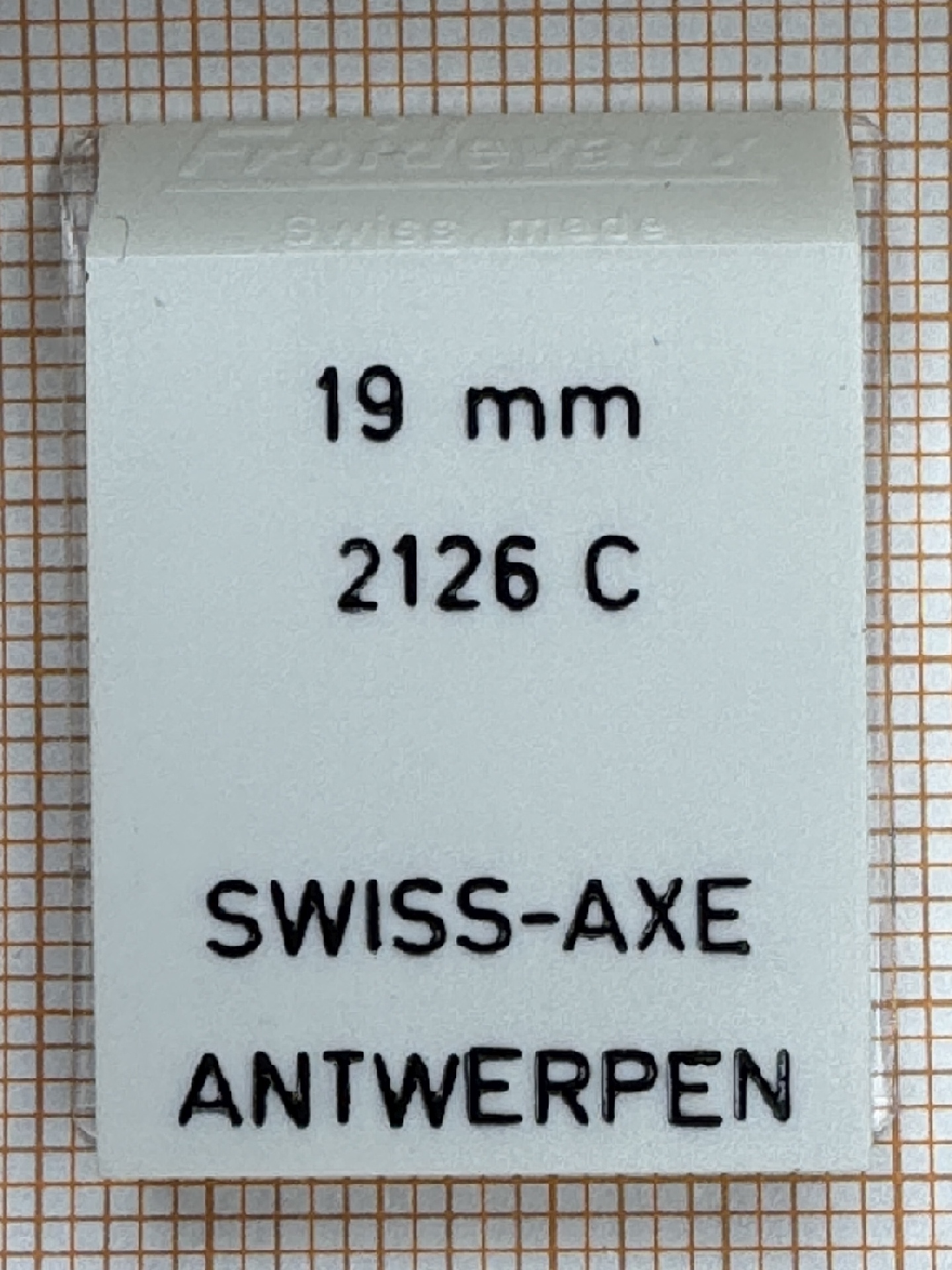Weißer Federsteg für Uhren mit 19 Millimeter Breite.