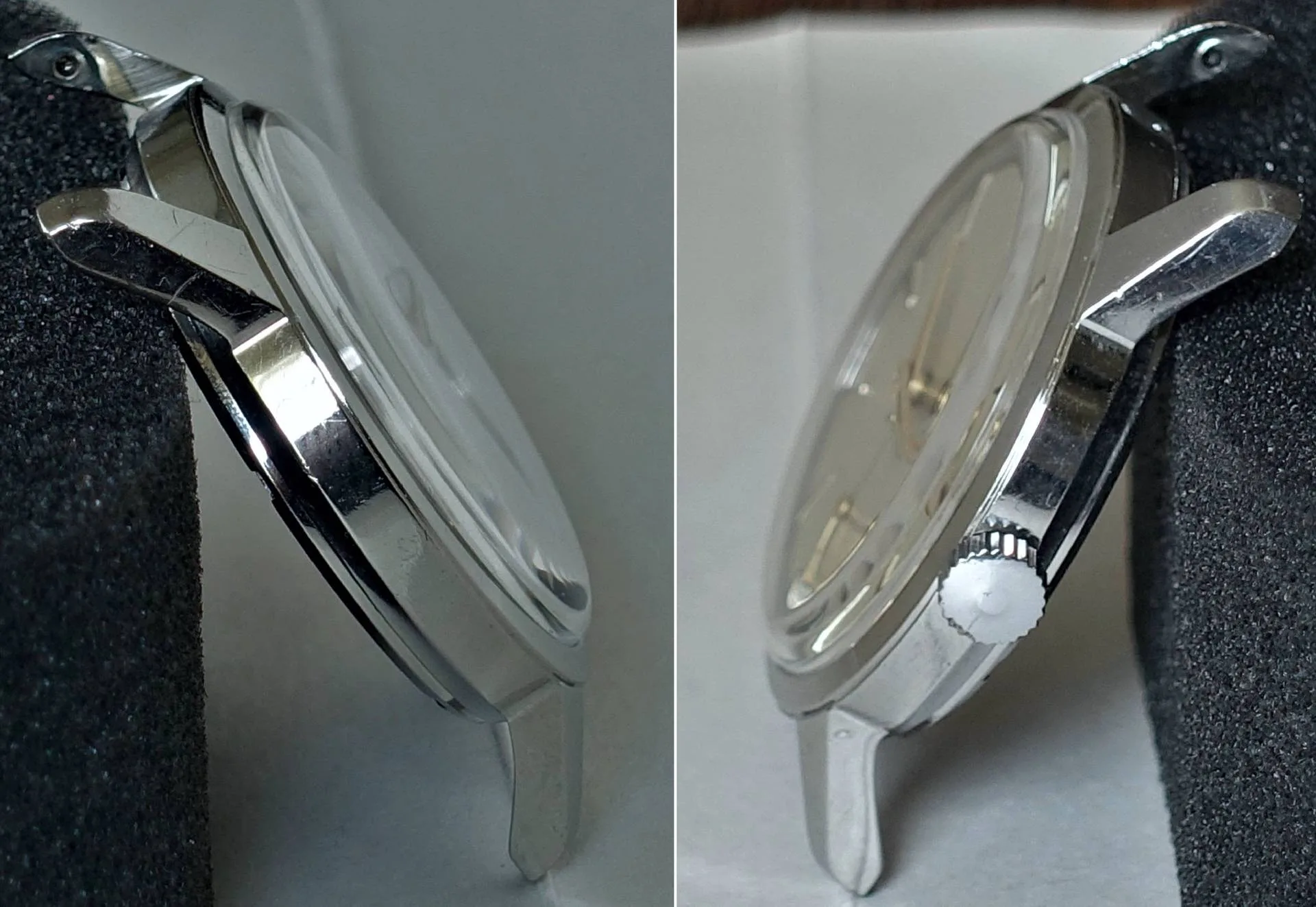 Armbanduhr silberfarben Silberfarbene Armbanduhr mit rundem Gehäuse und weißer Krone, seitlich fotografiert.