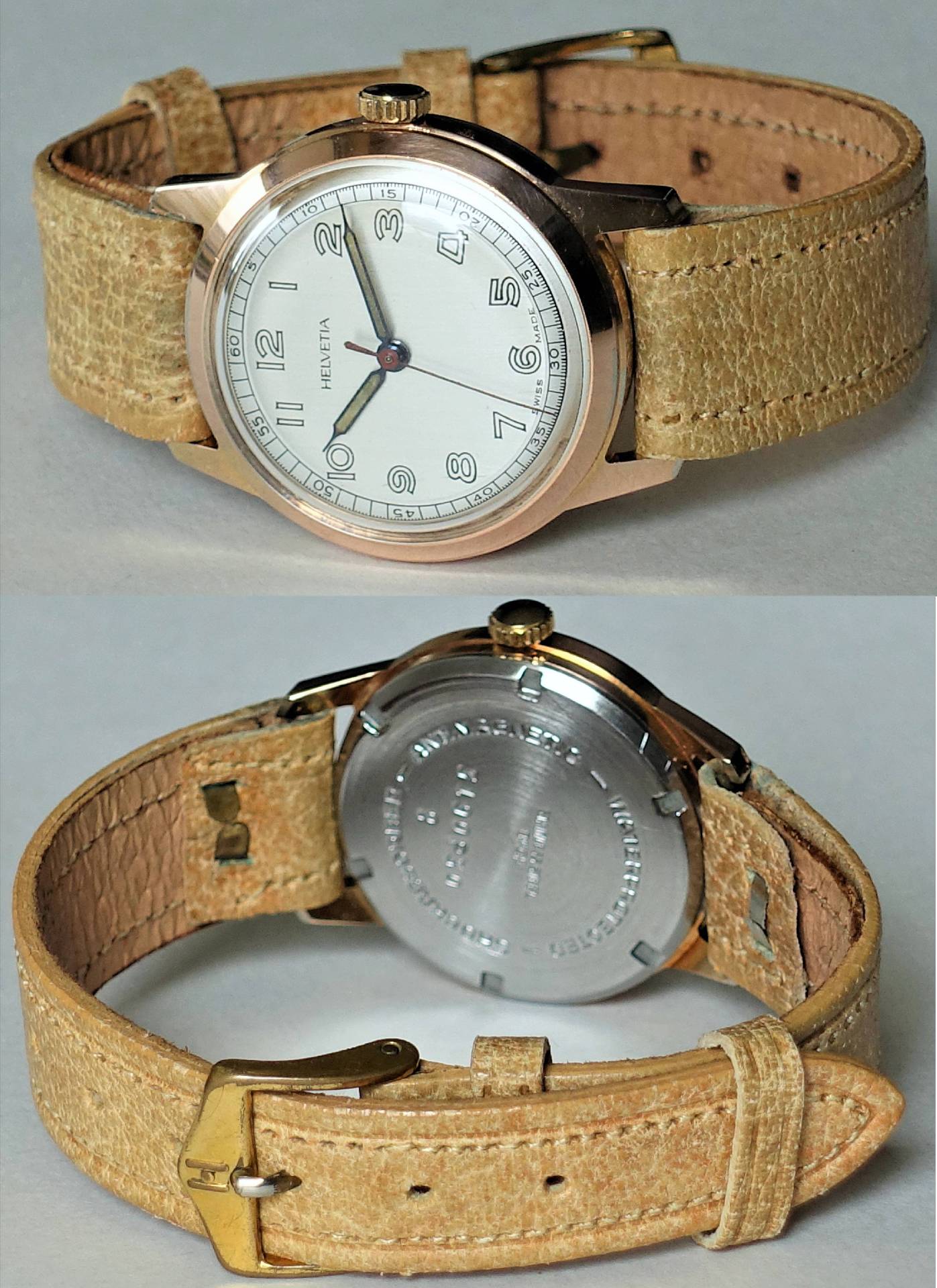 Klassische Armbanduhr mit beigem Lederarmband und hellem Zifferblatt.