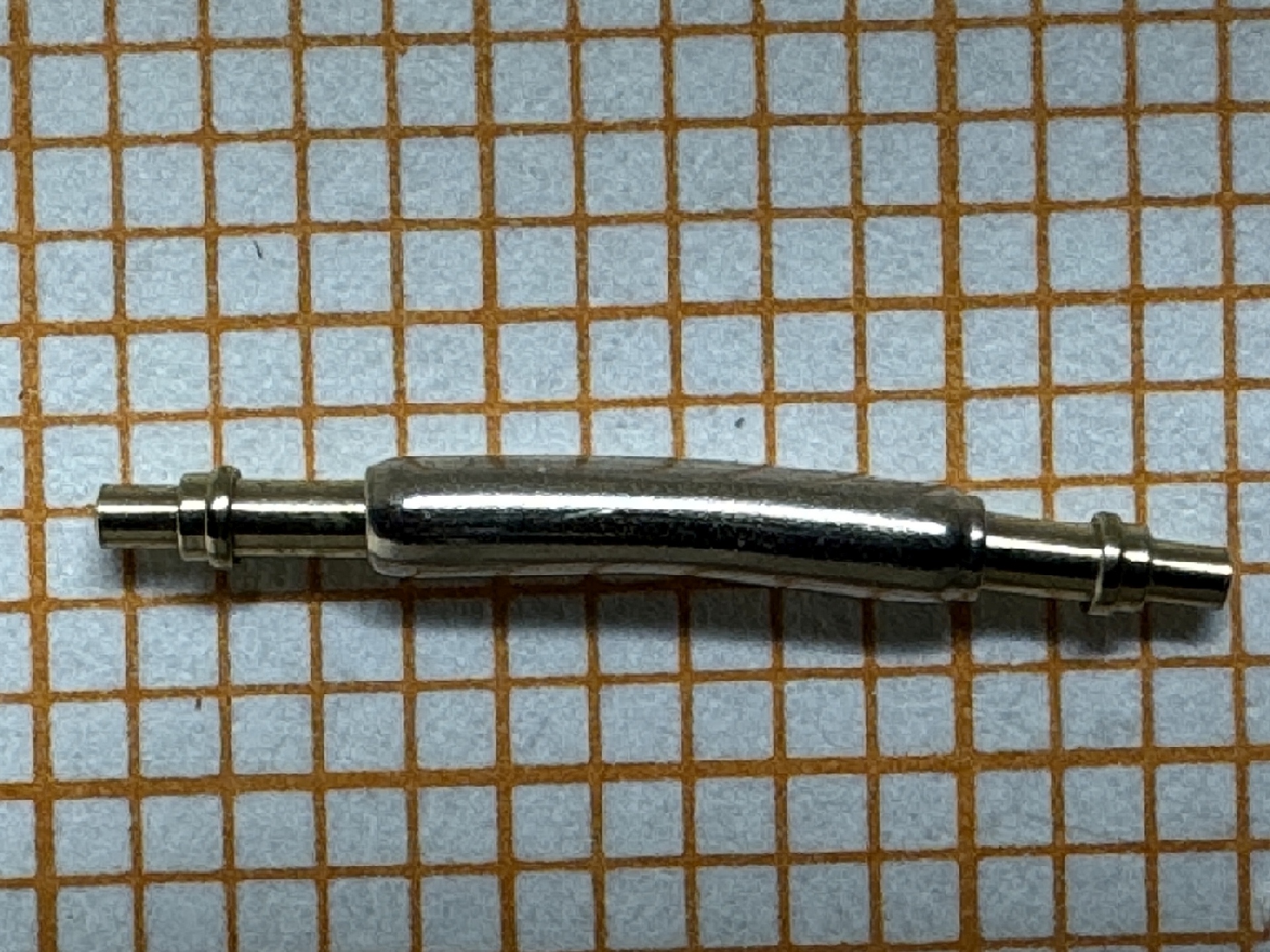 Gebogener Federsteg aus Metall für Uhrenarmbänder.