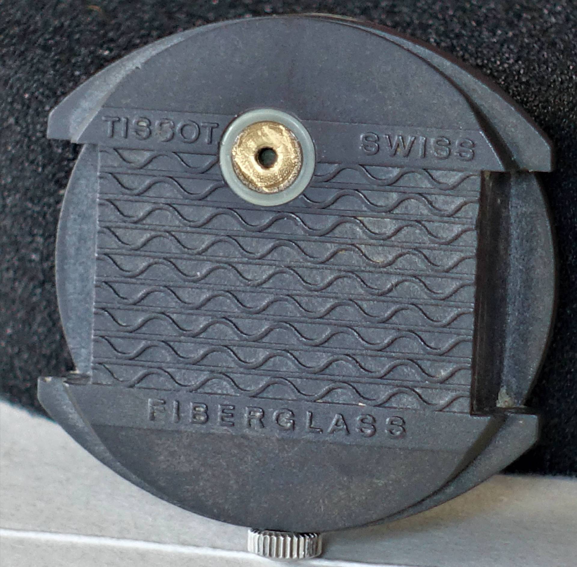 Schwarze Tissot-Uhrmacherwerkzeugbasis mit mittigem Metalleinsatz, hergestellt aus Fiberglas