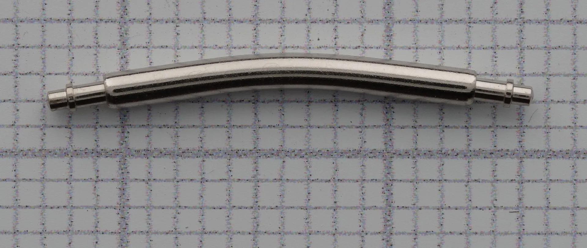Gebogener Federsteg Edelstahl Gebogener Federsteg aus silberfarbenem Edelstahl für Uhrenarmbänder.