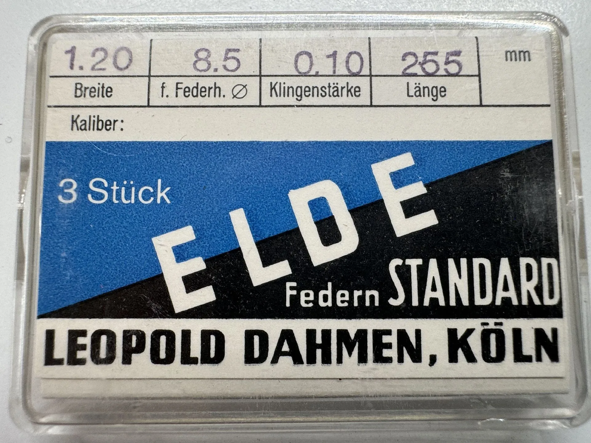 Verpackung mit drei Uhrwerk-Federn der Marke ELDE für Uhrenreparatur.