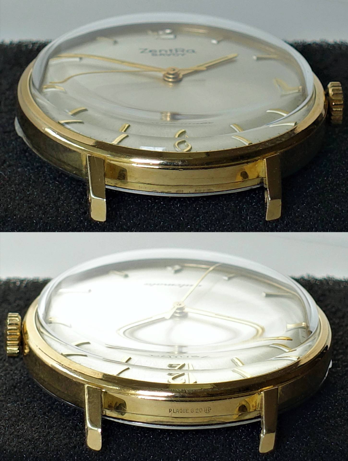 Flache Armbanduhr mit goldfarbenem Gehäuse, weißem Zifferblatt und goldfarbenen Zeigern.