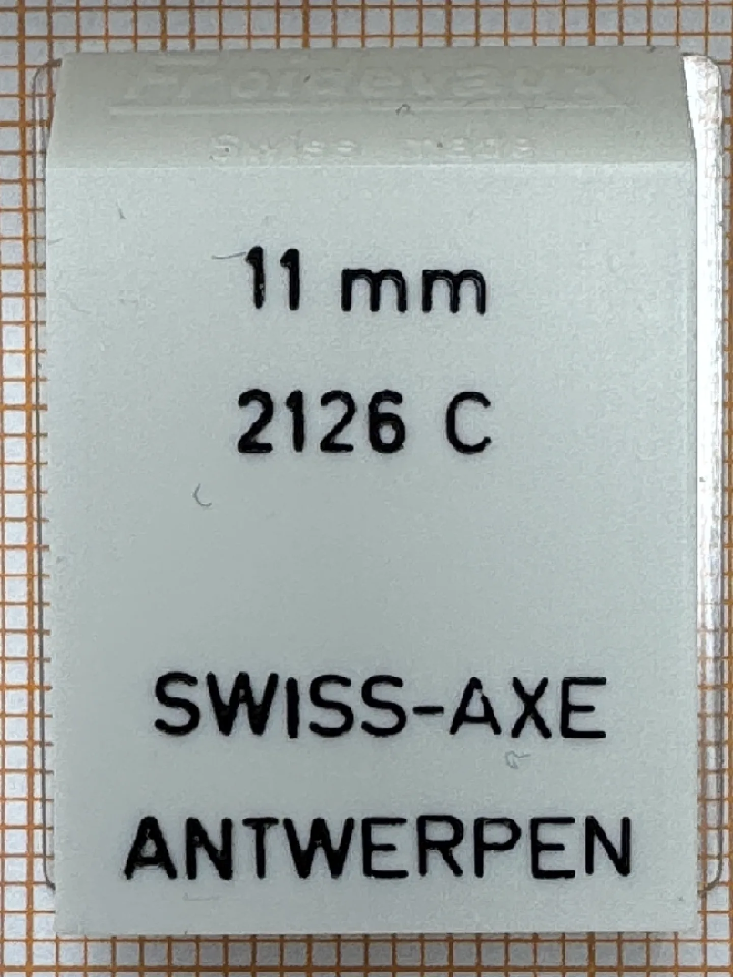 Weißes Ersatzteil für Uhrwerke mit der Aufschrift 11 mm 2126 C von SWISS-AXE.