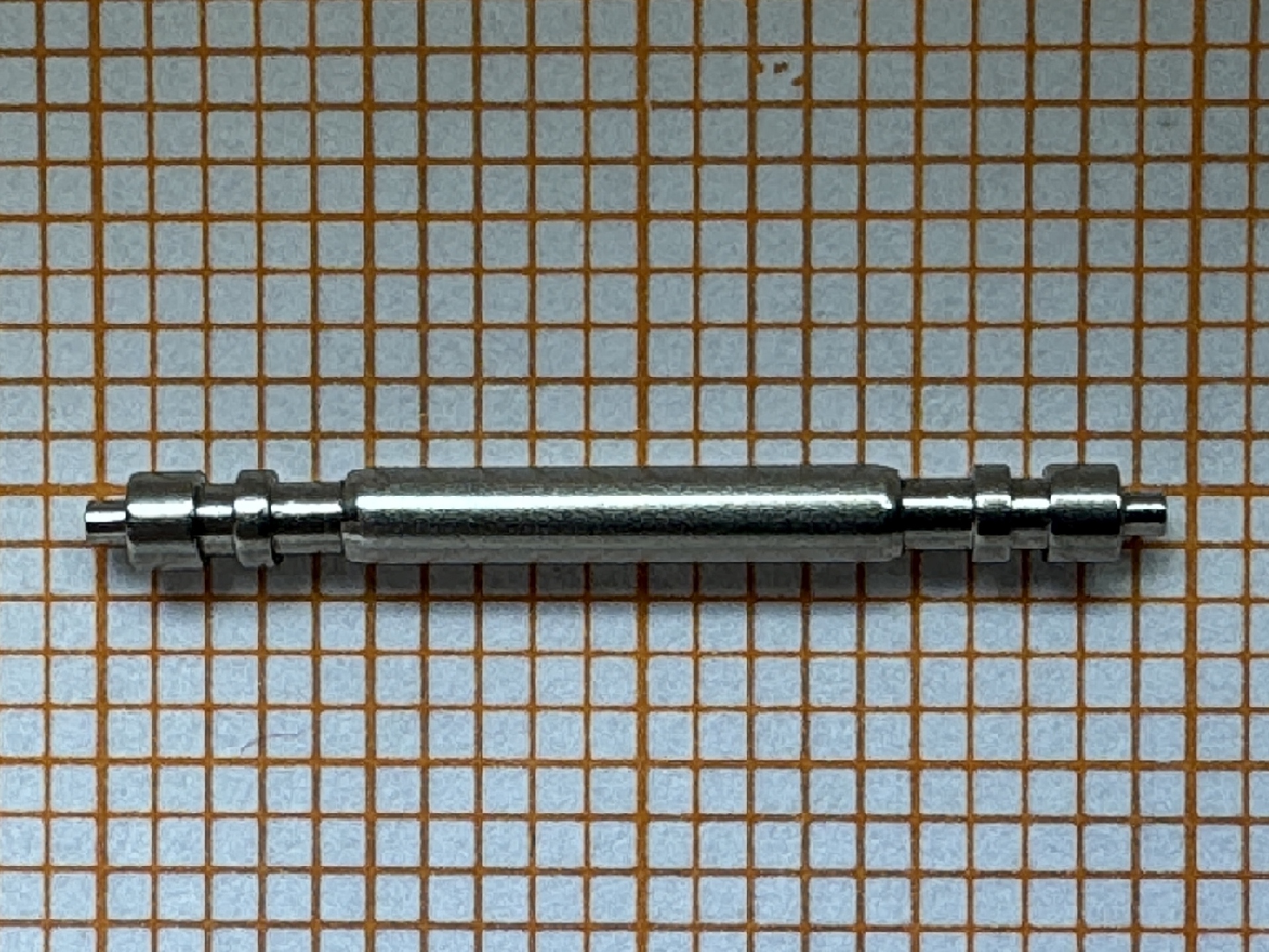 Metallener Federsteg für Uhrenarmbänder.