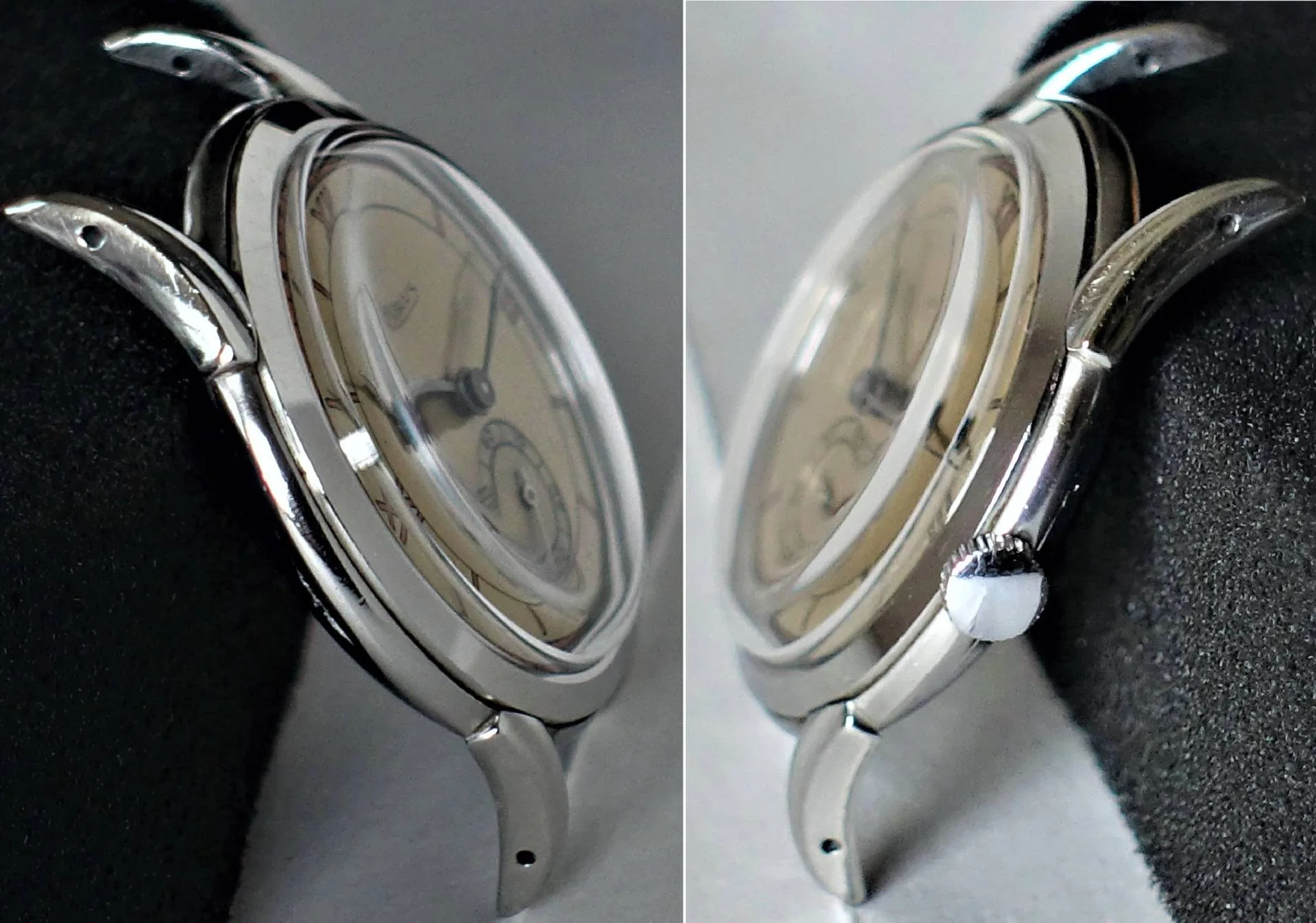 Beige Zifferblatt silbernes Gehäuse Die Uhr besitzt ein beiges Zifferblatt und ein silberfarbenes Gehäuse mit markanten Bandanstößen.