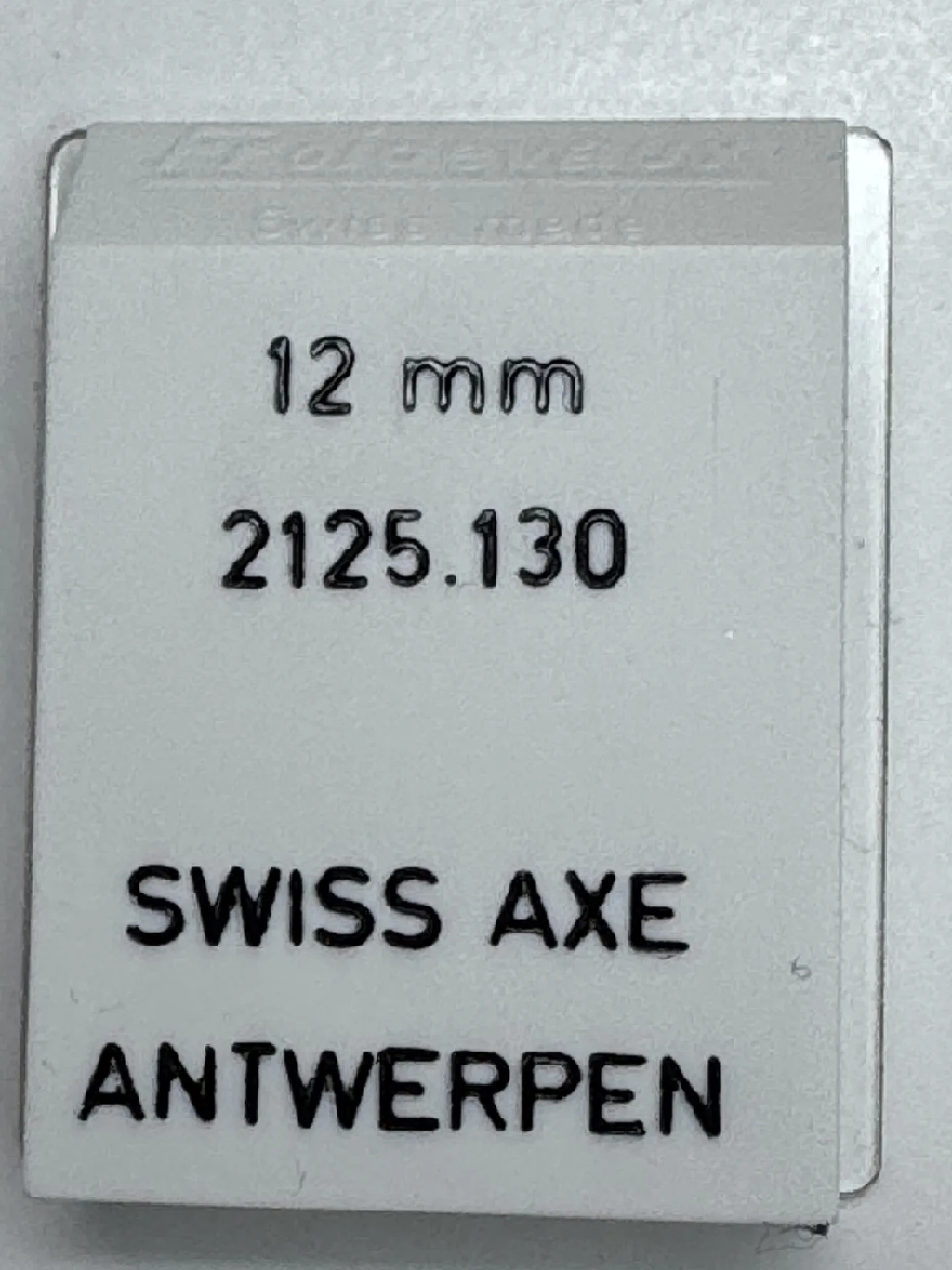 Swiss Axe 12mm Verpackung für eine 12 mm Swiss Axe für Uhren, mit Aufschrift "2125.130" und "Antwerpen".