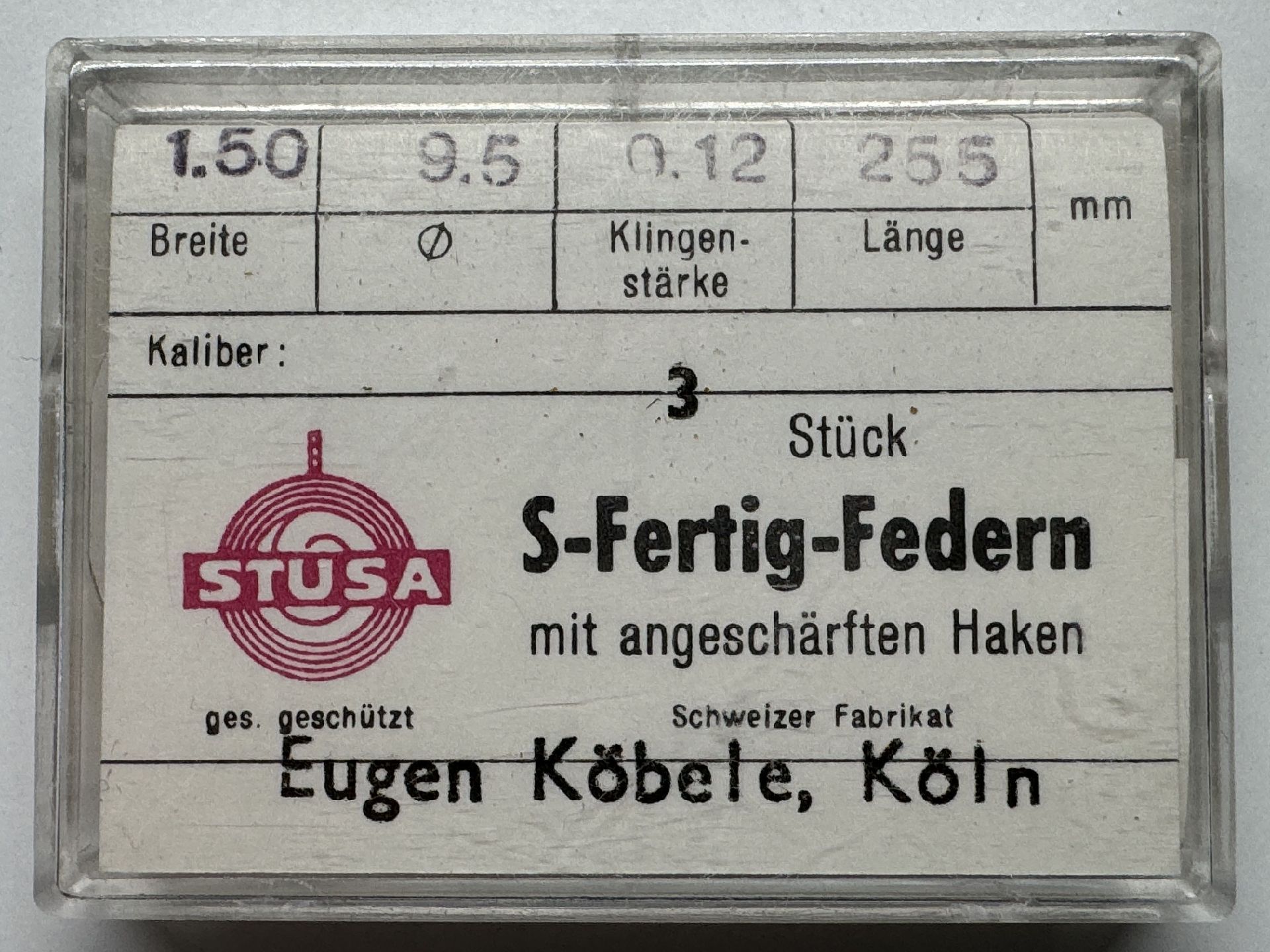 Verpackung mit drei Uhrwerksfedern der Marke STUSA für Uhrenreparatur.