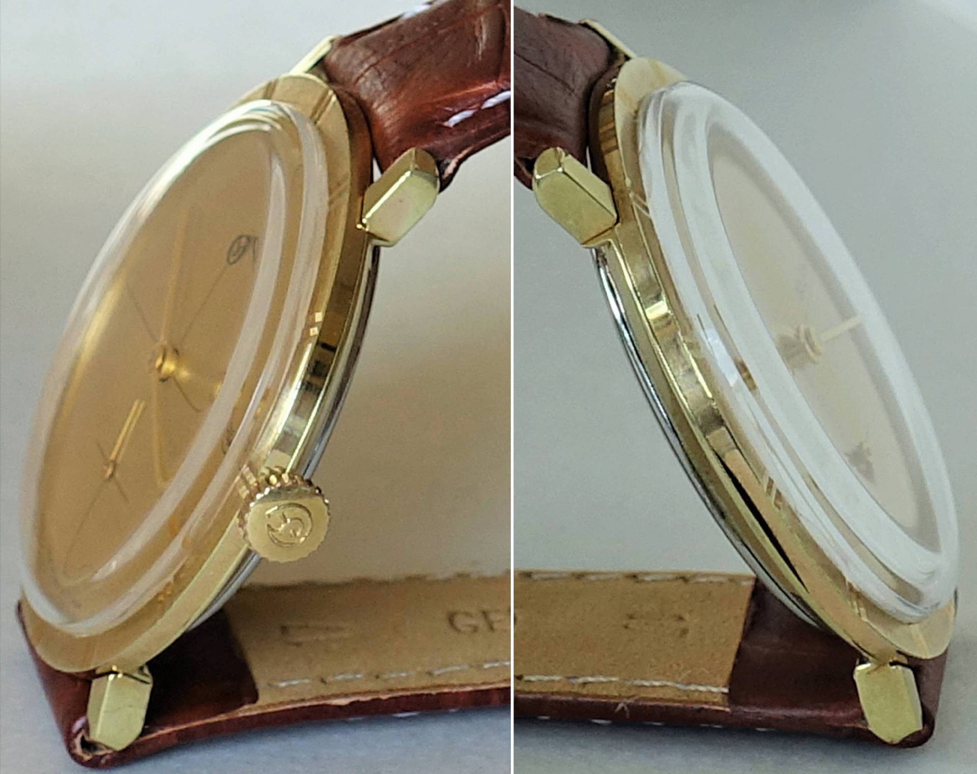 Flache Armbanduhr mit goldfarbenem Gehäuse, braunem Armband und hellem Zifferblatt.