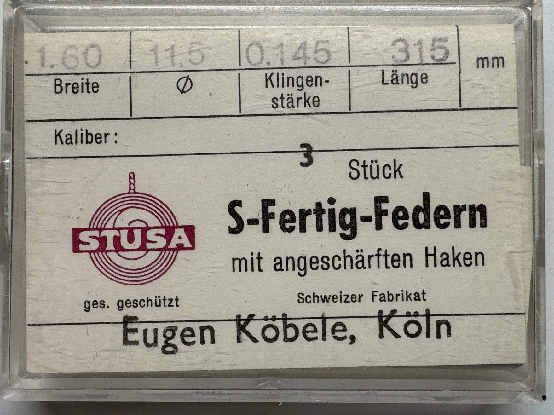 S-Fertig-Federn Set Verpackung mit drei S-Fertig-Federn für Uhren mit angeschärften Haken.