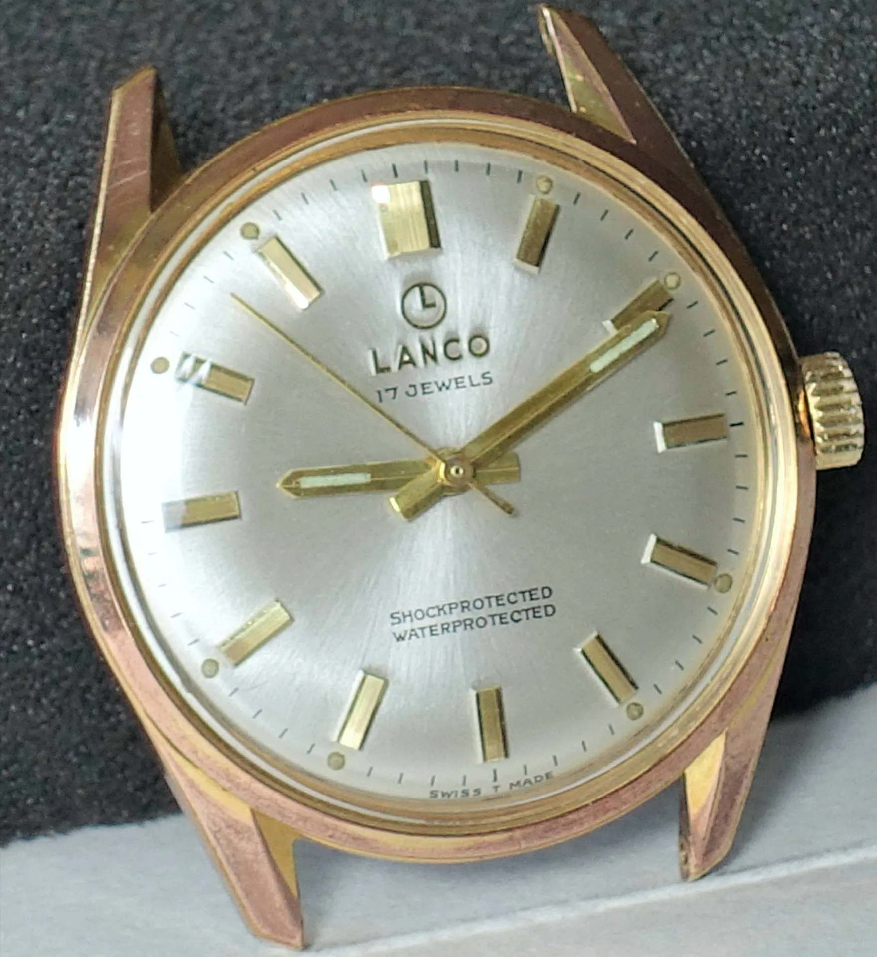 Lanco Armbanduhr goldfarben Goldfarbene Armbanduhr mit silbernem Zifferblatt und goldenen Indizes.