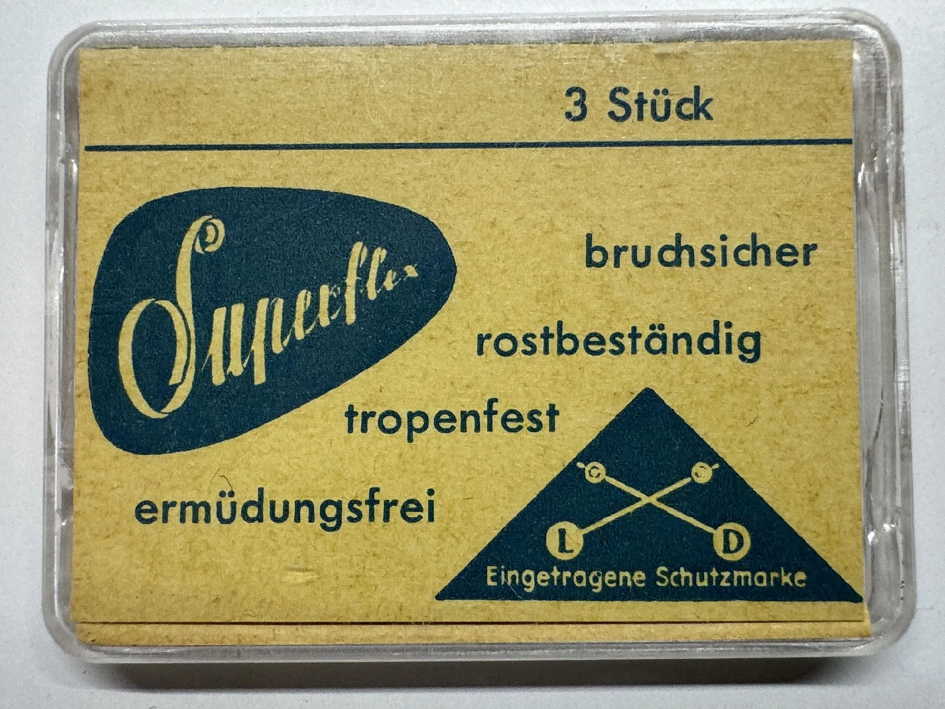 Verpackung mit drei Uhr-Federstegen in einer transparenten Box.