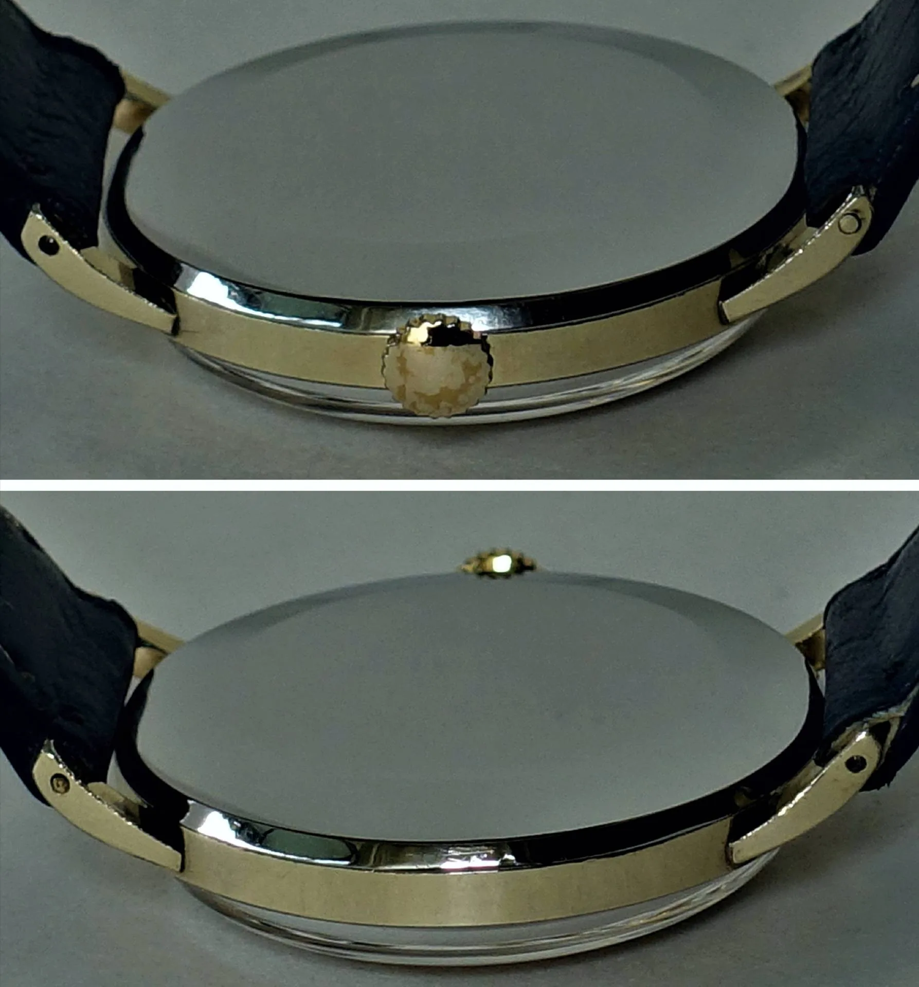 Armbanduhr Gehäuse goldfarben Rundes, goldfarbenes Gehäuse einer Armbanduhr mit seitlicher Krone und schwarzem Armband.