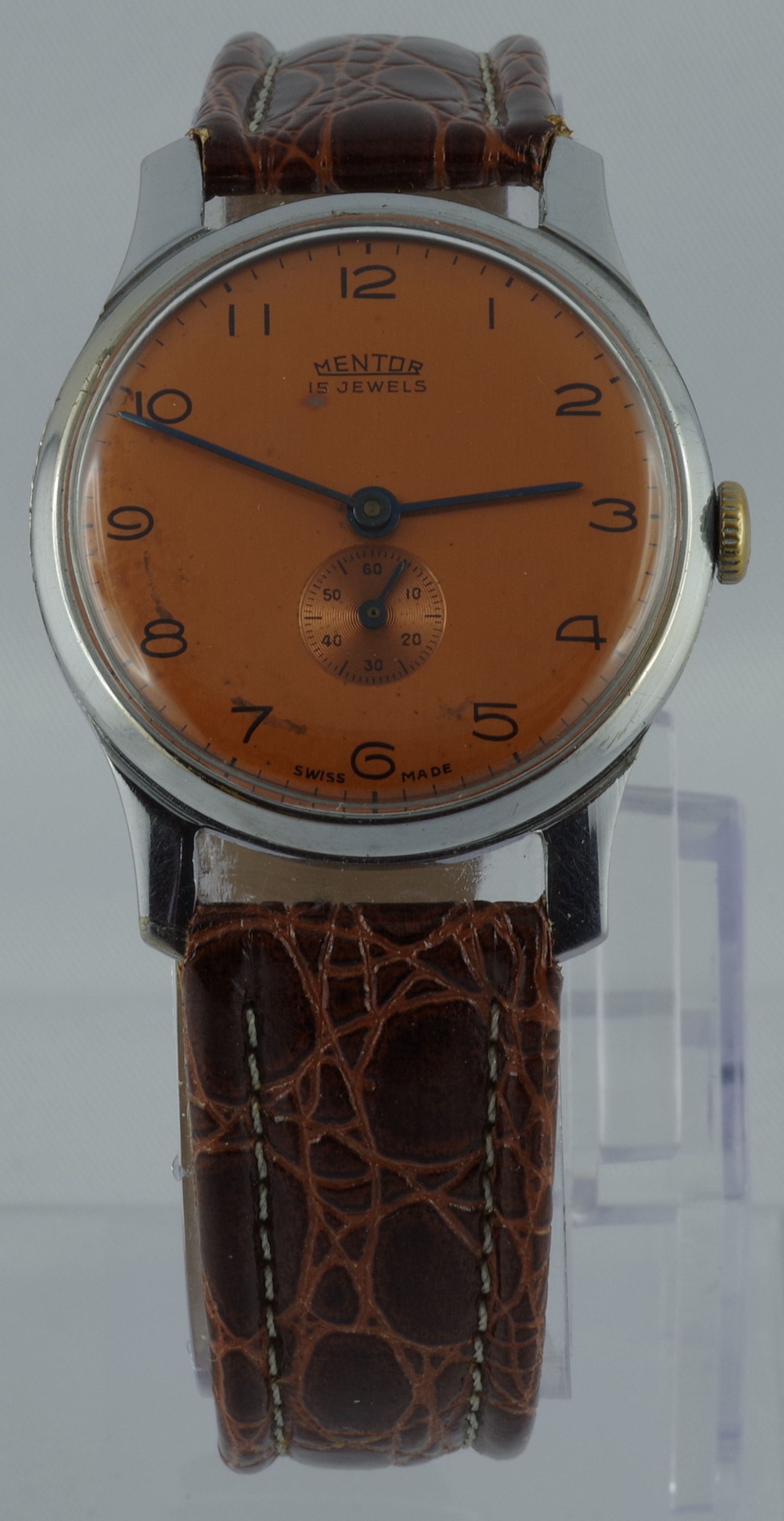 Charmante Vintage-Armbanduhr – Mentor 15 Steine mit kupferfarbenem Zifferblatt & Baumgartner Werk
