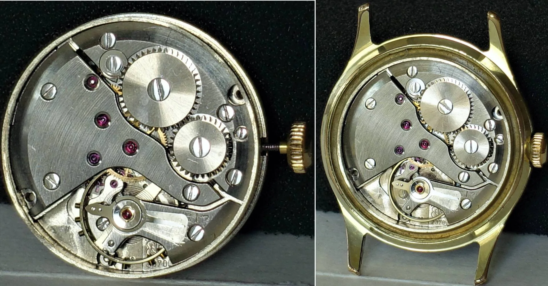 Mechanisches silberfarbenes Uhrwerk mit sichtbaren Zahnrädern und goldfarbener Krone.