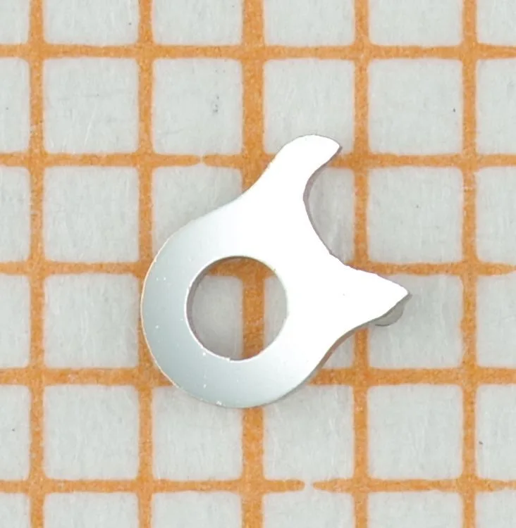 Kleine silberfarbene Halteplatte aus Metall für Uhrwerke.