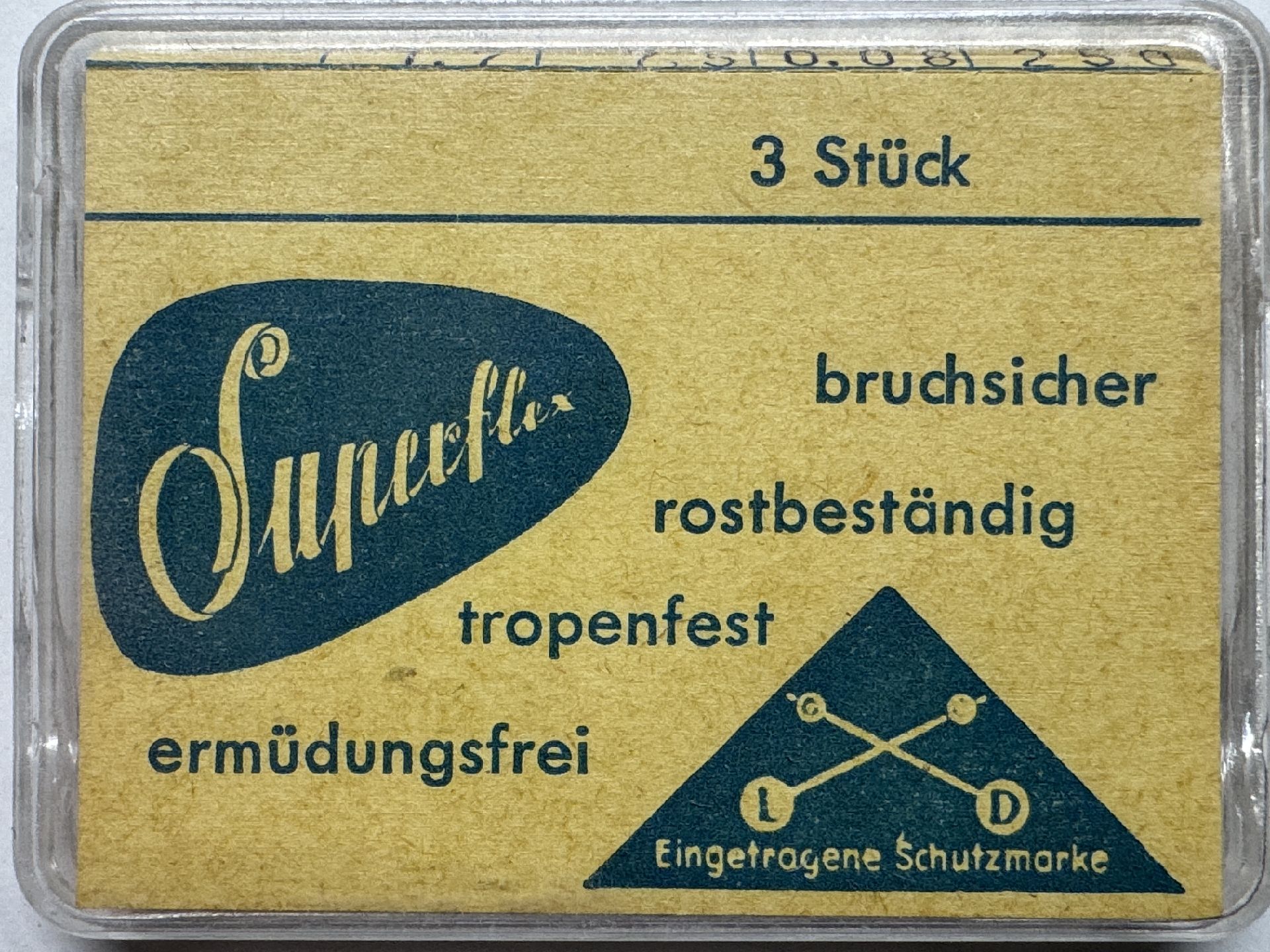 Verpackung mit drei Superflex Federstegen für Uhren, gelb-blau bedruckt.