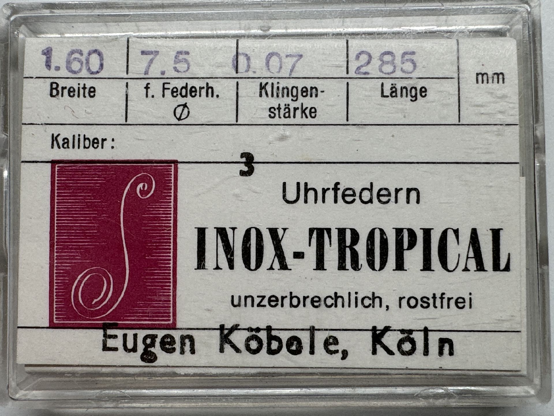 Verpackung mit drei silberfarbenen Uhrfedern der Marke INOX-TROPICAL für Armbanduhren.