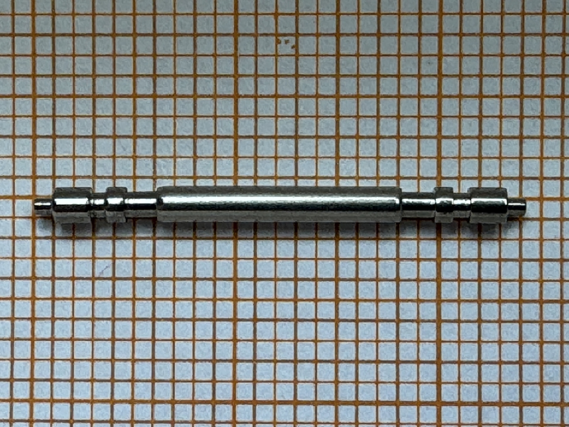 Metallener Federsteg für Uhrenarmbänder.