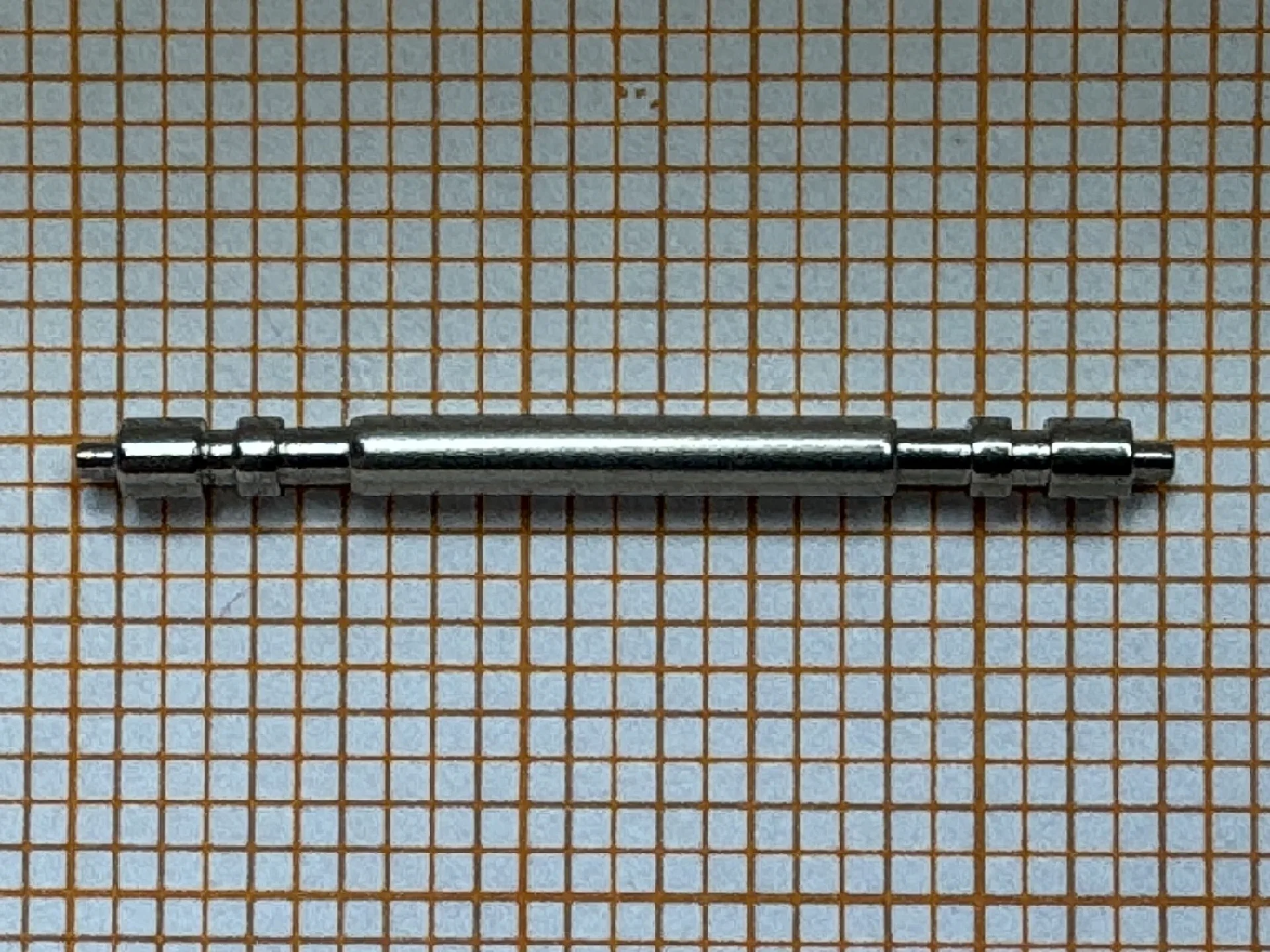 Metallener Federsteg für Uhrenarmbänder.