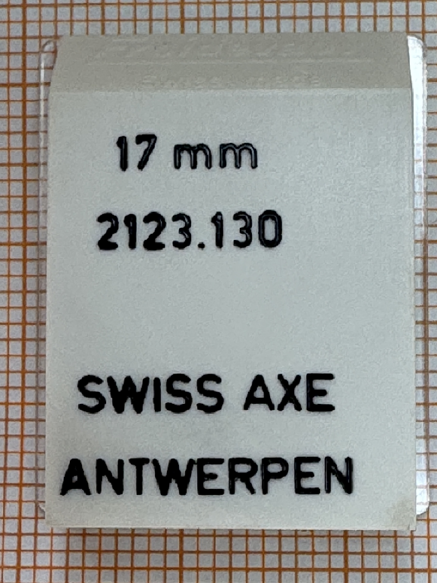 Verpackung für ein Uhrwerk mit der Bezeichnung 2123.130 und 17 mm Breite.